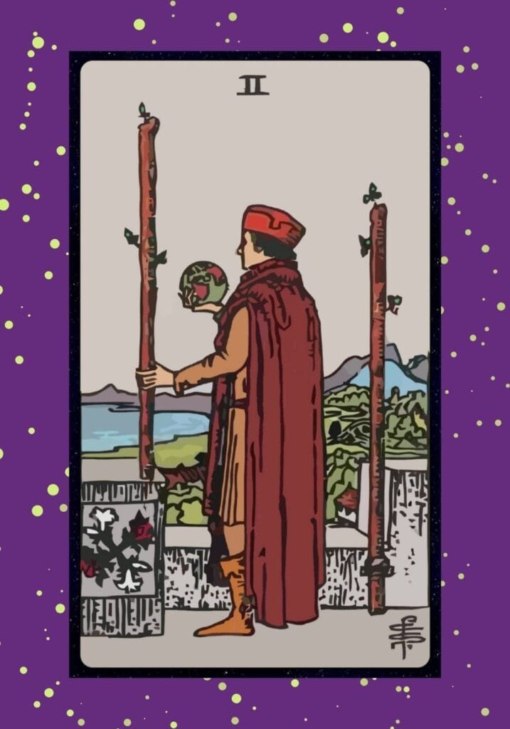 Two of Wands tarot card upright – a figure stands between two wands holding a globe, overlooking vast land, symbolizing planning, decision-making, and future possibilities.