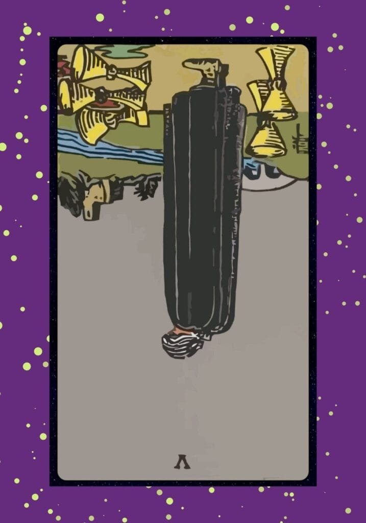 Reversed Eight of Cups tarot card – symbolizing resistance to change, emotional stagnation, fear of walking away, or returning to a past situation with new awareness.